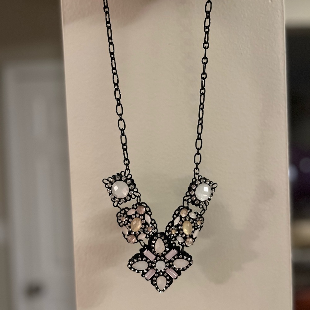 Elegant Floral Necklace with Black and White Accents